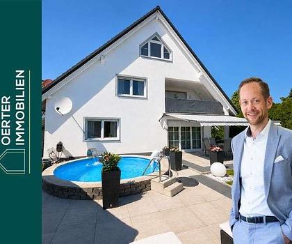 RESERVIERT - Großzügiges Haus mit zwei Wohneinheiten, Pool und Weitblick in Adelsdorf-Neuhaus