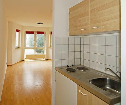 TOP Appartement mit TG-Stellplatz und Küchenzeile.