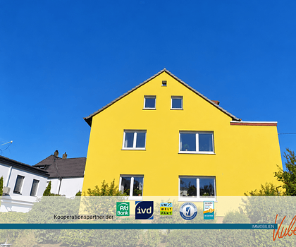 Solide vermietetes 3-Familienhaus mit Entwicklungspotenzial in unverbaubarer Lage von Stein b. Nbg.
