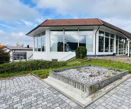 Baugrundstück mit Blick ins Sulzachtal (ehem. Autohaus)