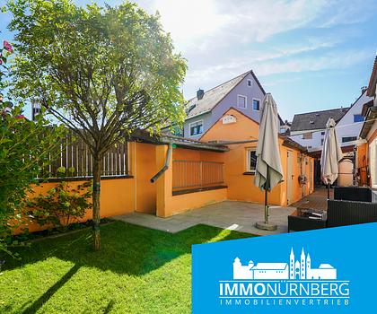 Wie für Familien gemacht: Haus mit Innenhof, Hobbybereich und Garten