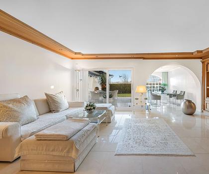 HEGERICH: Elegante Gartenresidenz mit Villencharakter in Grünwald – Exklusives Wohnen in Bestlage