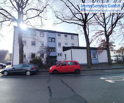 4-Familienhaus und Bankgebäude, aufgeteilt nach WEG, Garagen, Stellplätze,...
