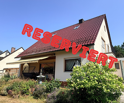 Freistehendes Einfamilienhaus mit sonnigem Garten und Garage